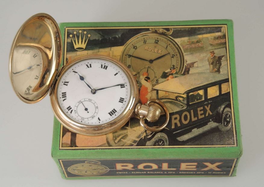Rolex pocket watch and original box.