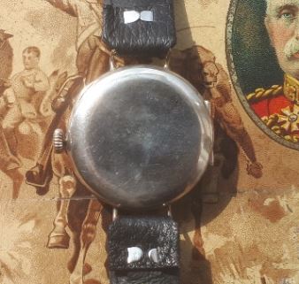 Swiss made gentlemen's silver trench watch, case back.