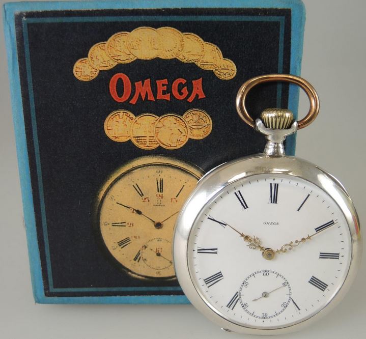 Antique silver omega pocket watch and box.