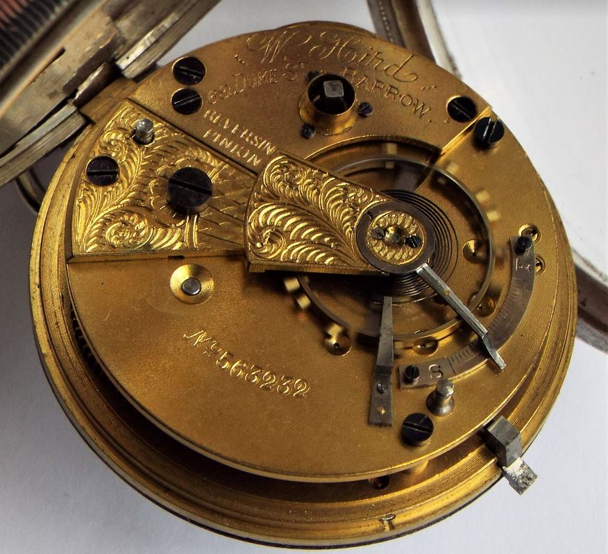 Engraved movement for an antique silver Lancashire Watch Company pocket watch.