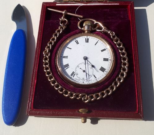 Case knife and pocket watch.