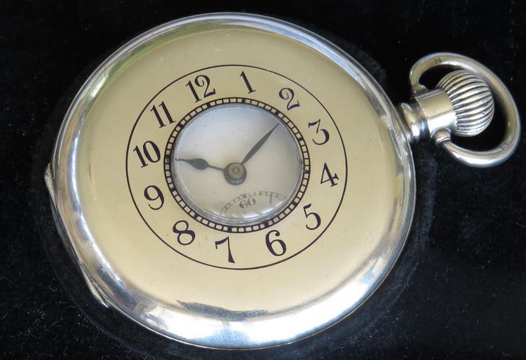 Link to Antique silver Revue half hunter pocket watch.