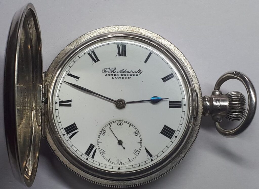 Image of hunter cased pocket watch. Link to antique James Walker pocket watch, 1920.