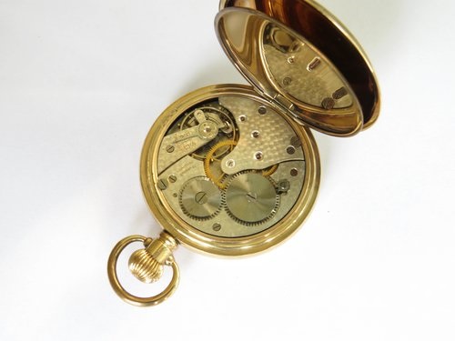 Antique Satisfaction pocket watch movement.