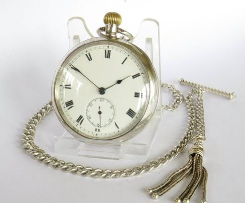Antique Omega pocket watch and chain.